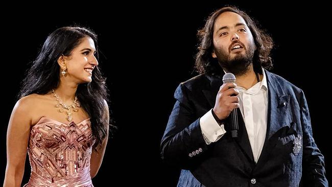 Anant Ambani (R), son of billionaire tycoon Mukesh Ambani, with his fiance Radhika Merchant during their three-day pre-wedding celebration in Jamnagar. Picture: AFP photo/Reliance