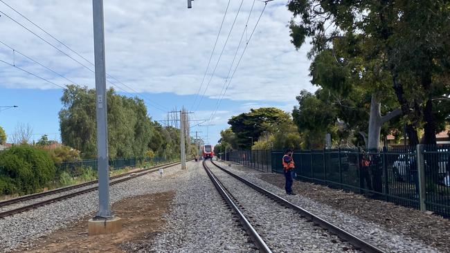 Police on the rail line at Black Forest after a pedestrian was killed.