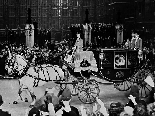 Queen Elizabeth II and her husband Prince Philip, Duke of Edinburgh are cheered by the crowd after their wedding ceremony. Picture:AFP