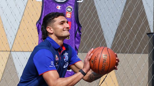 MELBOURNE, AUSTRALIA - AUGUST 30 2024Jamarra Ugle-Hagan shoots a basketball at the NBL SuperCoach Launch.Picture: Brendan Beckett