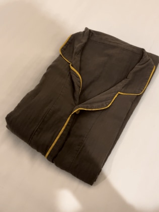 A fresh pair of pyjamas were left on the bed each day by housekeeping. Picture: Simone Mitchell