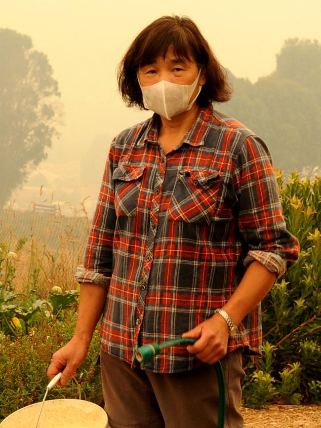 Cassandra Rolph, of Deep End Farm, on fire patrol in her garden last month. Picture: DAVID ROLPH