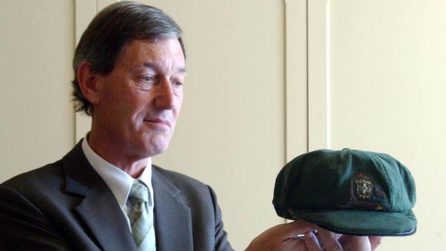 Fraudster accountant Peter Dunham – who owns the baggy green – holding it when he lent it to the State Library.