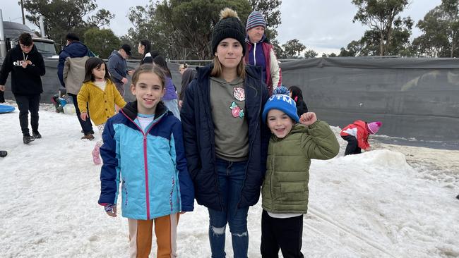 Brisbane family Rubie (10), Rhianna (11) and Phoenix Morrissey (6) experience snow for the first time on day 2 of the 2021 Snowflakes in Stanthorpe festival. Photo: Madison Mifsud-Ure / Stanthorpe Border Post