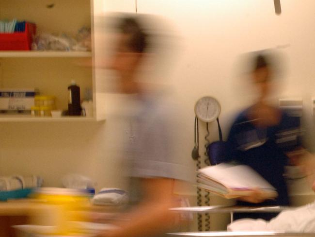 29/04/2006 PIRATE: Patient Lesley Whitrod with nurse Kyran Woods and Dr. Cynthia Papendick in the Royal Adelaide Hospital (RAH) emergency department 28 Apr 2006. doctor