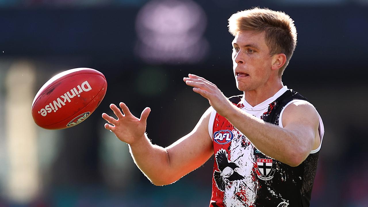 SYDNEY, AUSTRALIA - JUNE 05: Sebastian Ross of the Saints gathers the ball during the round 12 AFL match between the St Kilda Saints and the Sydney Swans at Sydney Cricket Ground on June 05, 2021 in Sydney, Australia. (Photo by Cameron Spencer/Getty Images)