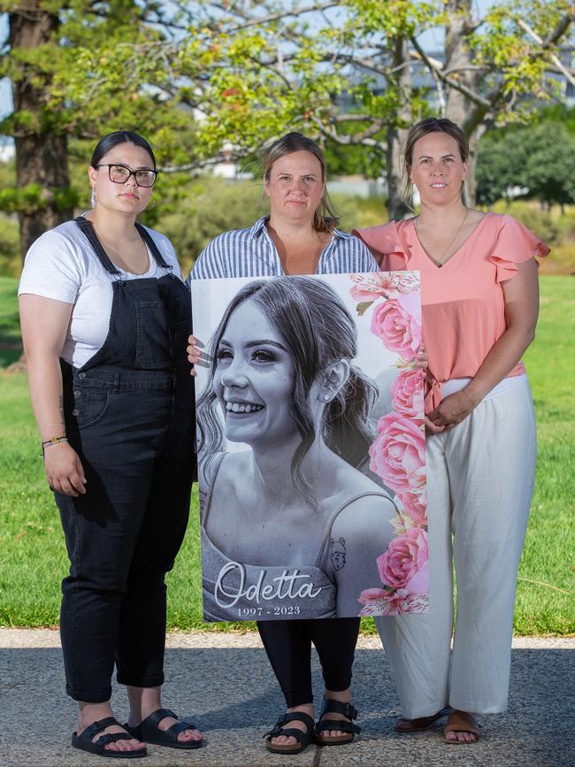 Isobel Vlahiotis, Carrie Maxwell, holding photo of Odetta, and Leah Maxwell. Picture: Ben Clark