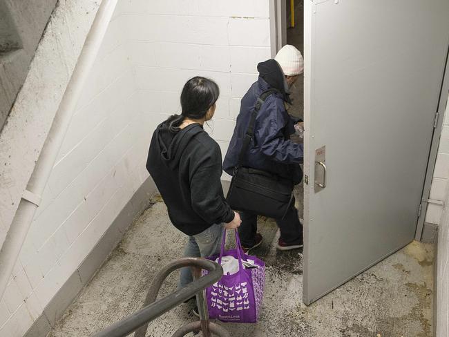 Vinny and his friend leave the carpark after injecting heroin in a stairwell. Picture: Ian Currie