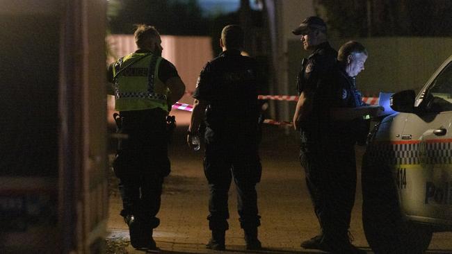 Police cordon off a block of units where a person was shot in the suburb of The Gardens. Picture: AAP