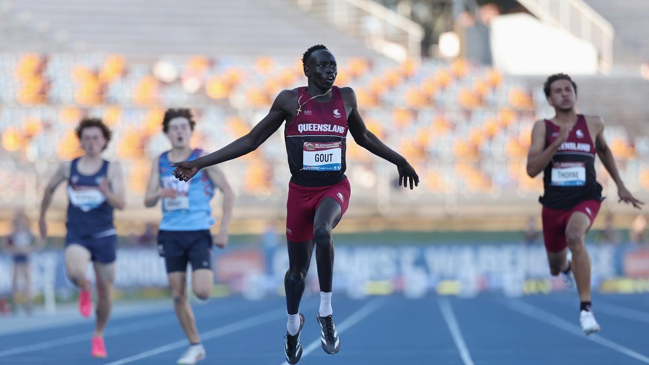 Ipswich Grammar School student Guot Guot winning the 2024 Chemist Warehouse Australian All Schools Athletics Championship 200m in an historic national record time during December. (Photo by Cameron Spencer/Getty Images)