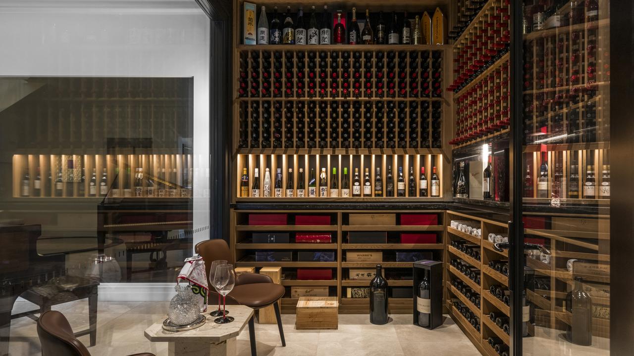 Step inside the luxe wine cellar.