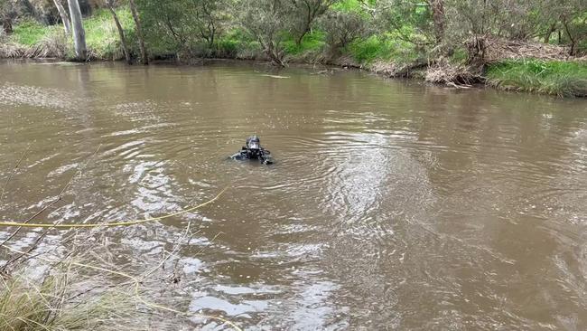 Victorian police divers search a river near Melbourne for the remains of missing Adelaide man Kerry Giakoumis. Picture: Vic Police