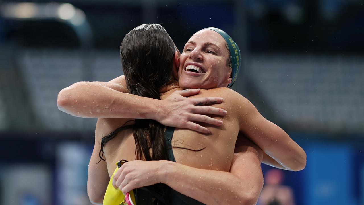 Kaylee McKeown is congratulated by Emily Seebohm after winning the gold medal. Picture: Getty Images