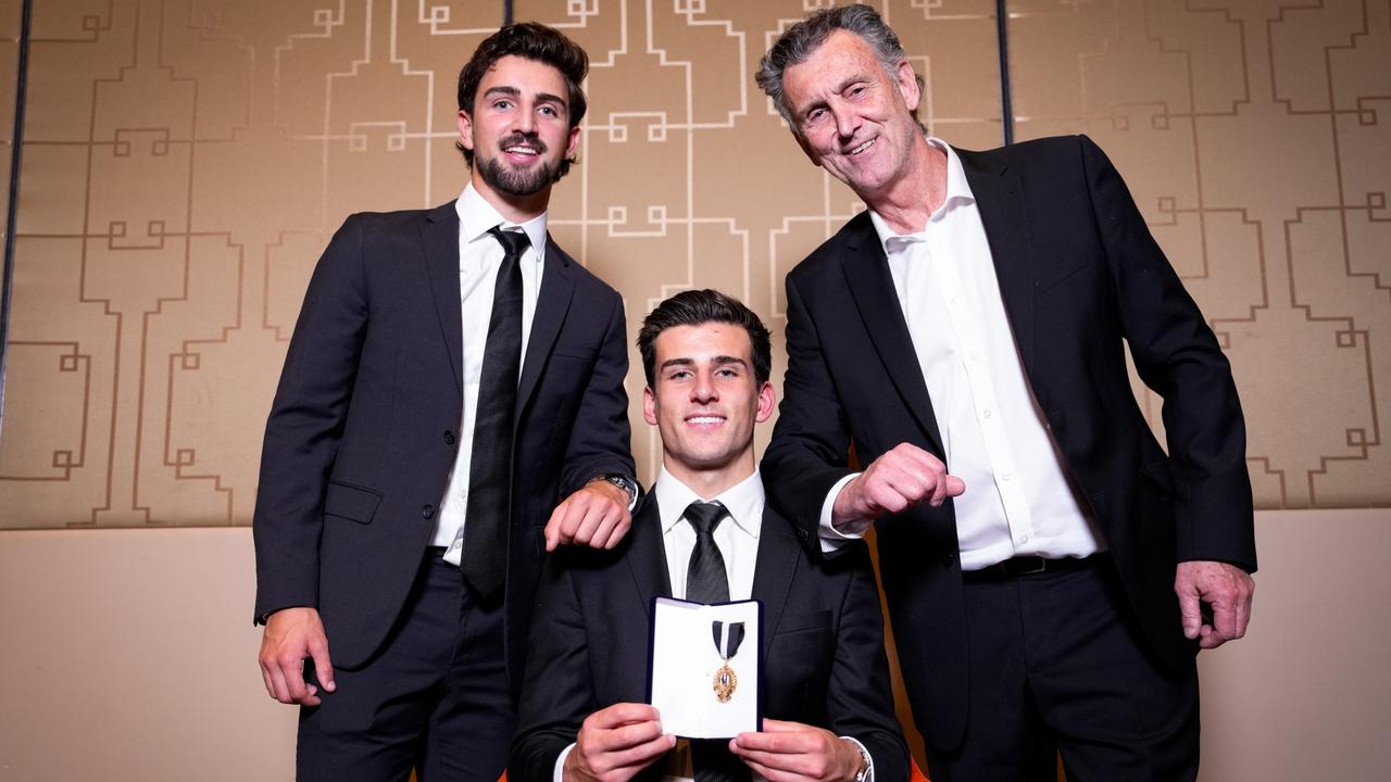 Josh Daicos, Nick Daicos and Peter Daicos pose for a photo after Nick Daicos won the E.W Copeland Trophy. Photo by Asanka Ratnayake/AFL Photos/via Getty Images.