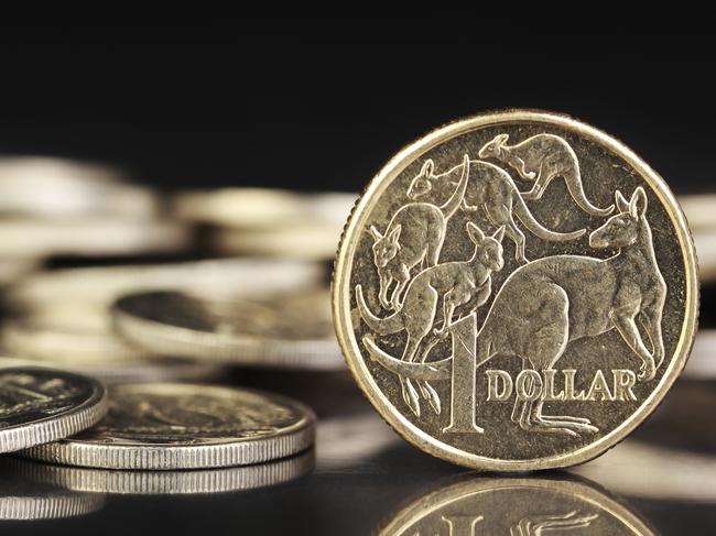 Australian dollar coins on a dark reflective background. Picture: iStock