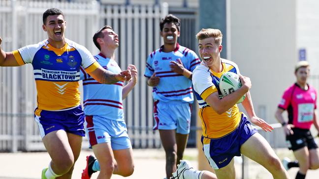 Ethan Sanders on his way to the tryline in Pats Blacktown’s win over St. Greg’s. Picture: Toby Zerna