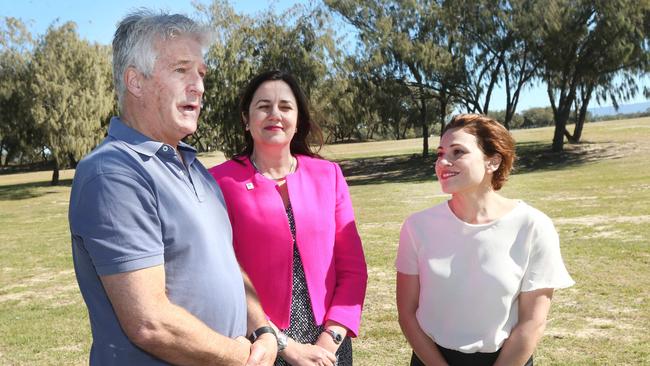 An overwhelmed Save Our Spit Alliance president Steven Gration flanked by. Premier Annastacia Palaszczuk and Planning Minister Jackie Trad at The Spit. Picture Mike Batterham