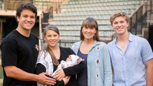 Chandler, Bindi, Terri and Robert pose with baby Grace.