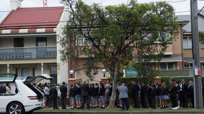 Dozens of students waited outside the school. Picture: NCA NewsWire / Flavio Brancaleone