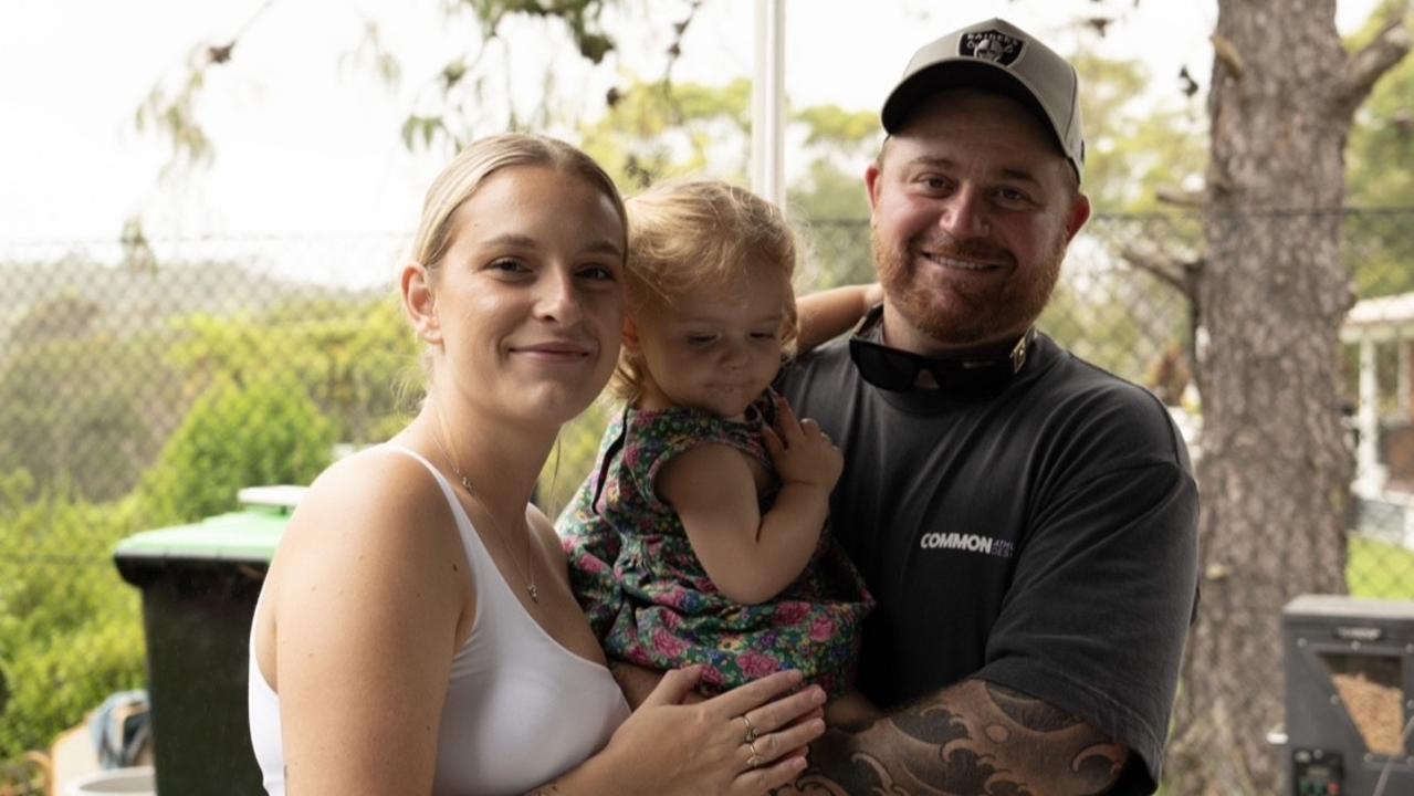 Keely Bevan with her partner Bryce and two-year-old daughter Stevie who purchased a VanHome to live in the backyard of their family in the Northern Beaches.