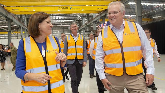 Queensland opposition leader Deb Frecklington, left, and Scott Morrison at the opening of the Rheinmetall Military Vehicle Centre of Excellence in Redbank on Sunday. Picture: Sarah Marshall