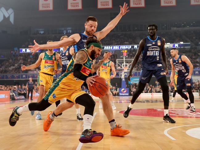 Matthew Dellavedova in full cry at John Cain. Picture: Getty