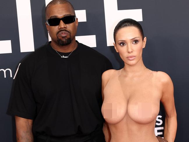 PIXELATED VERSIONS -  LOS ANGELES, CALIFORNIA - FEBRUARY 02: (EDITOR'S NOTE: Image contains nudity.) L-R, Kanye West and Bianca Censori attend the 67th Annual GRAMMY Awards on February 02, 2025 in Los Angeles, California.  (Photo by Matt Winkelmeyer/Getty Images for The Recording Academy)