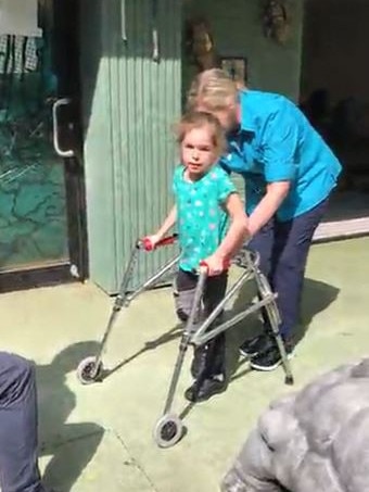 She became determined to walk after watching her brother take his first steps. Picture: Supplied.