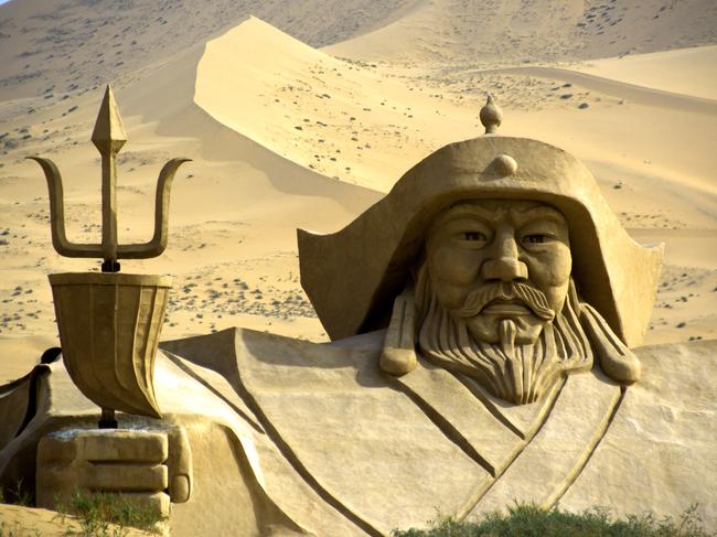 The enormous Genghis Khan statue in the middle of Badain Jaran desert. This desert is home to some of the tallest stationary dunes on Earth, some reaching a height of more than 500 meters. The desert features over 100 lakes that lie between the dunes, some of which are fresh water while others are extremely saline.