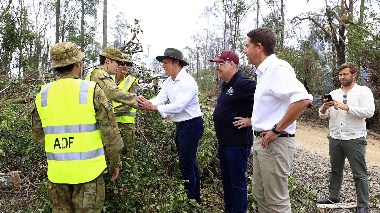 The Premier Steven Miles visits the ADF who have moved in to help in the clean up at Kriedeman Road in Wangawallan after ferocious storms damaged the Gold Coast area. Pics Adam Head