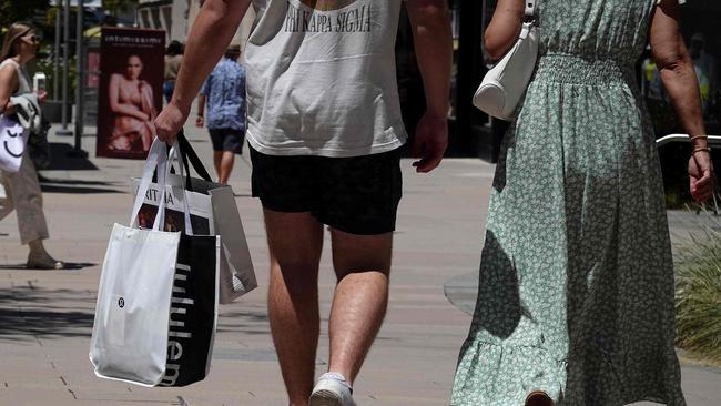 CORTE MADERA, CALIFORNIA - MAY 30: Shoppers carry shopping bags while walking through The Village at Corte Madera on May 30, 2024 in Corte Madera, California. According to a report by the U.S. Commerce Department, economic growth slowed considerably in the first three months of 2024 with gross domestic product coming in with growth of 1.3 percent annual rate compared to the 1.6 percent growth rate initially reported by the government in their preliminary first-quarter estimate. Photo by Justin Sullivan/Getty Images) (Photo by JUSTIN SULLIVAN / GETTY IMAGES NORTH AMERICA / Getty Images via AFP)