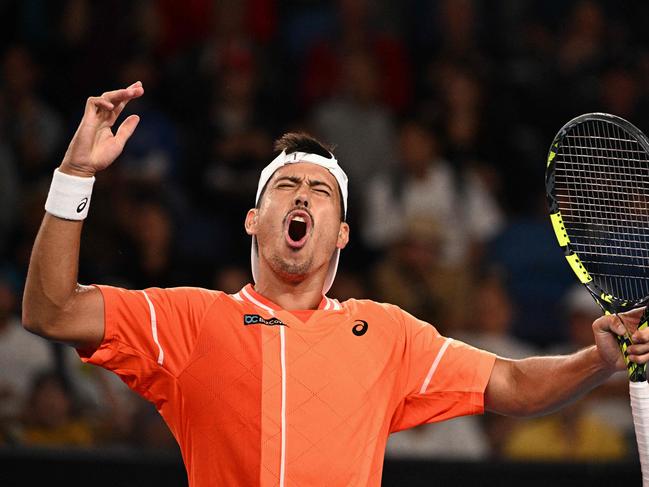 Australia's Jason Kubler reacts after a point against Colombia's Daniel Galan during their men's singles match on day one of the Australian Open tennis tournament in Melbourne on January 14, 2024. (Photo by Anthony WALLACE / AFP) / -- IMAGE RESTRICTED TO EDITORIAL USE - STRICTLY NO COMMERCIAL USE --