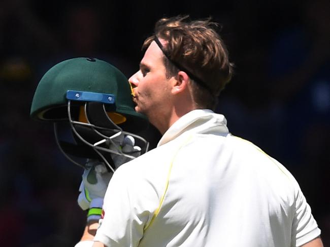 Australian captain Steve Smith celebrates after scoring a century on Day 3 of the Third Test match between Australia and England at the WACA in Perth, Saturday, December 16, 2017. (AAP Image/Dean Lewins) NO ARCHIVING, EDITORIAL USE ONLY, IMAGES TO BE USED FOR NEWS REPORTING PURPOSES ONLY, NO COMMERCIAL USE WHATSOEVER, NO USE IN BOOKS WITHOUT PRIOR WRITTEN CONSENT FROM AAP