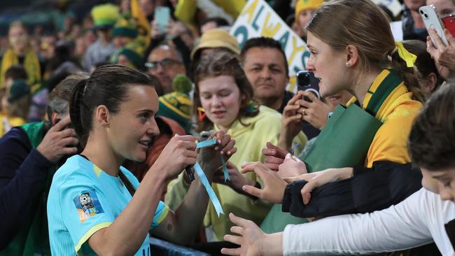 Matildas star Hayley Raso gives her ribbon to a supporter in the crowd at last year’s World Cup. Picture: Adam Head