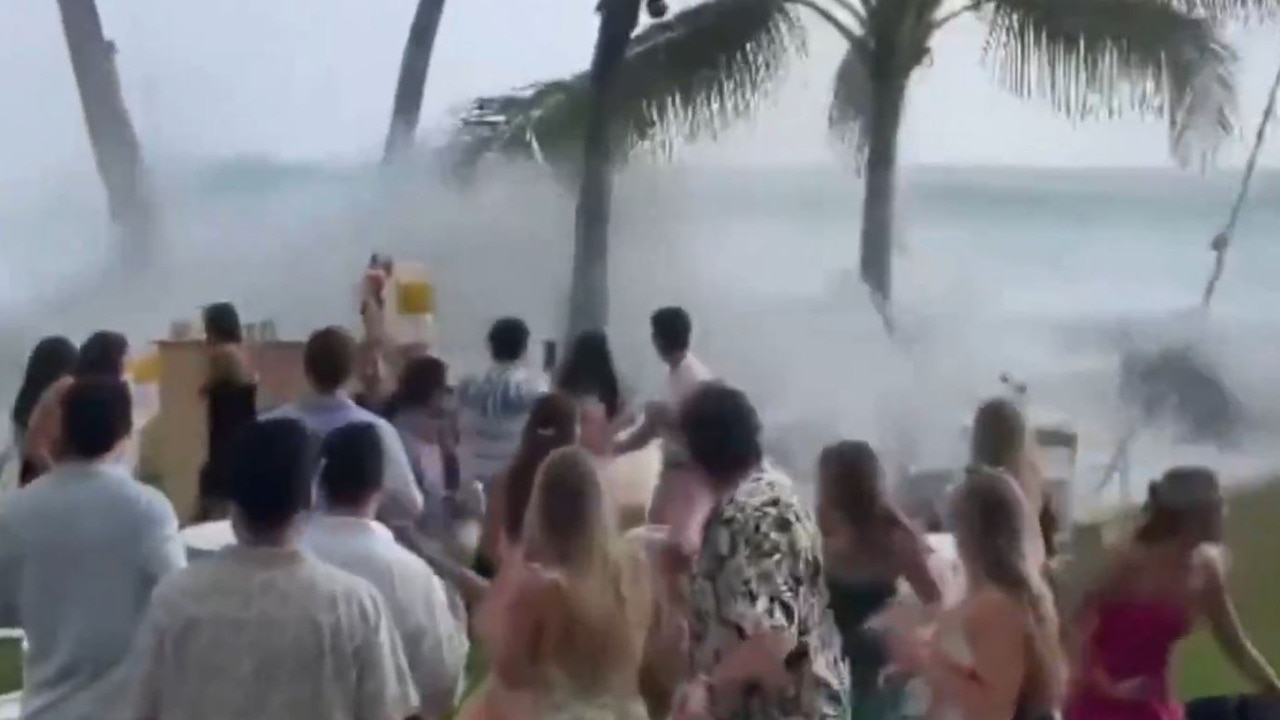 WATCH: Big wave crashes through Hawaiian wedding reception