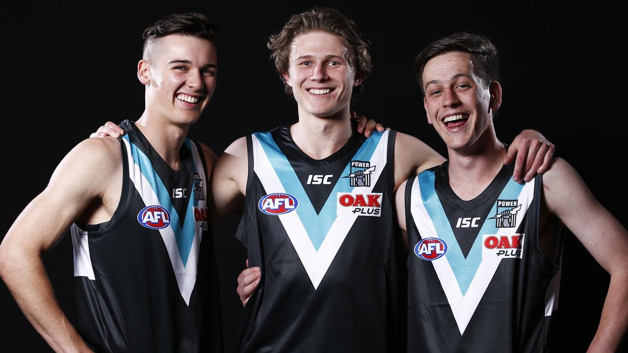 Connor Rozee, Xavier Duursma and Zak Butters on draft night 2018.