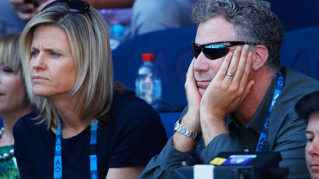 Hollywood star Will Ferrell and wife Viveca Paulin watch the second-round match between Caroline Wozniacki and Jana Fett on Day 3. Picture: Getty Images