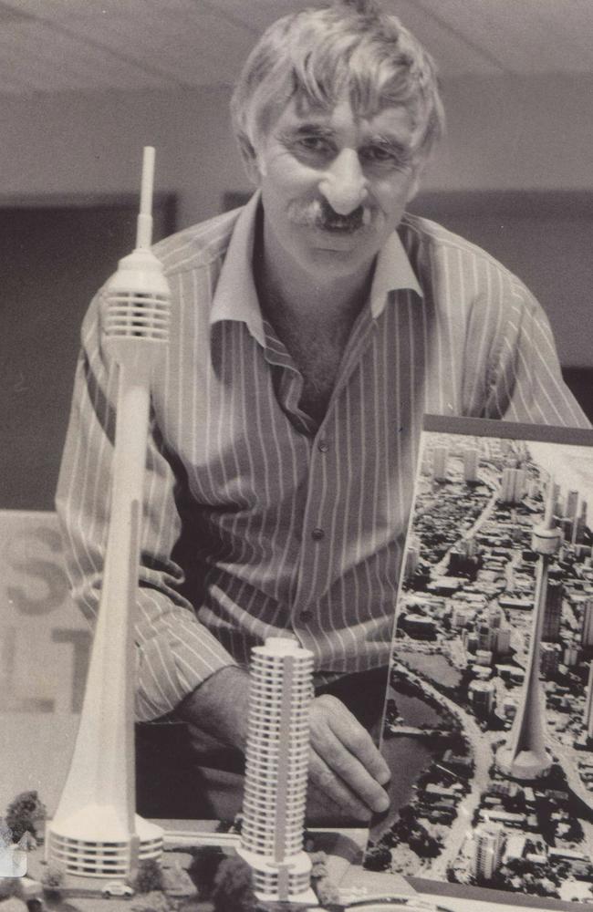 Pat Zarro with a model of the Zarro's Arrow development.