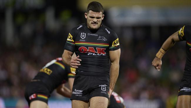 PENRITH, AUSTRALIA - JUNE 04: Nathan Cleary of the Panthers clutches his leg with an injury during the round 14 NRL match between Penrith Panthers and St George Illawarra Dragons at BlueBet Stadium on June 04, 2023 in Penrith, Australia. (Photo by Brett Hemmings/Getty Images)