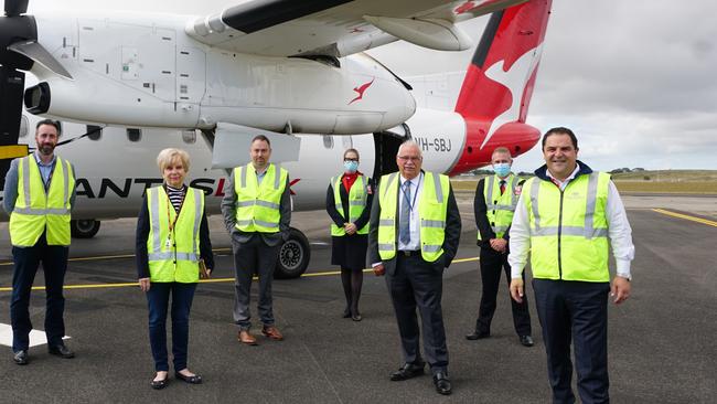 Representatives from Qantas, Grant Council, Mount Gambier Council and MP Tony Pasin welcome the first QantasLink flight at Mount Gambier Regional Airport in 2021. Picture: Jessica Ball