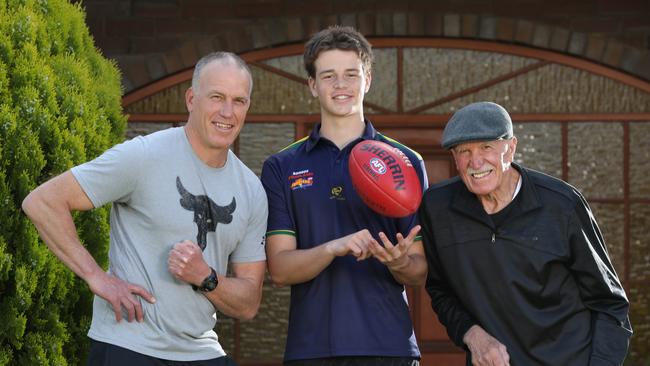 Top South Australian AFL draft prospect Mattaes Phillipou, with his dad, Sam, and grandfather, Peter, who are both former Eagles players. Picture: Dean Martin