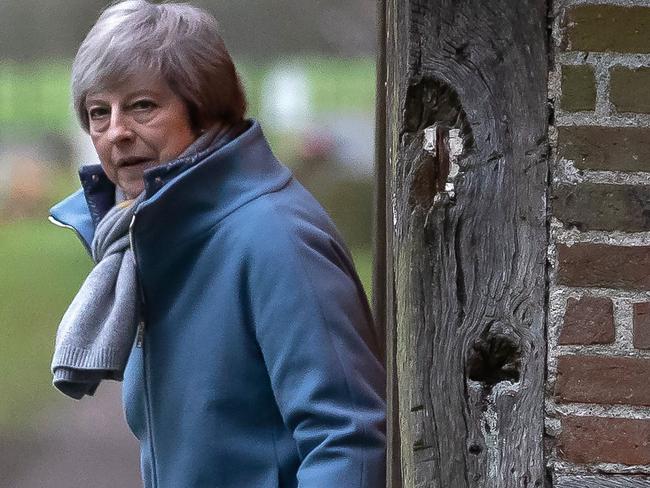 Britain's Prime Minister Theresa May leaves after attending a church service, near her Maidenhead constituency, west of London on January 13, 2019. - British Prime Minister Theresa May on Sunday warned MPs preparing to vote down her EU divorce deal that failing to deliver Brexit would be a "catastrophic and unforgivable breach of trust in our democracy". (Photo by Daniel LEAL-OLIVAS / AFP)