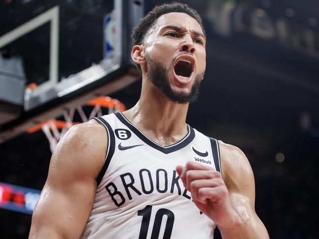 TORONTO, ON - NOVEMBER 23: Ben Simmons #10 of the Brooklyn Nets reacts after getting a block on Chris Boucher #25 of the Toronto Raptors during the second half of their NBA game at Scotiabank Arena on November 23, 2022 in Toronto, Canada. NOTE TO USER: User expressly acknowledges and agrees that, by downloading and or using this photograph, User is consenting to the terms and conditions of the Getty Images License Agreement. (Photo by Cole Burston/Getty Images)