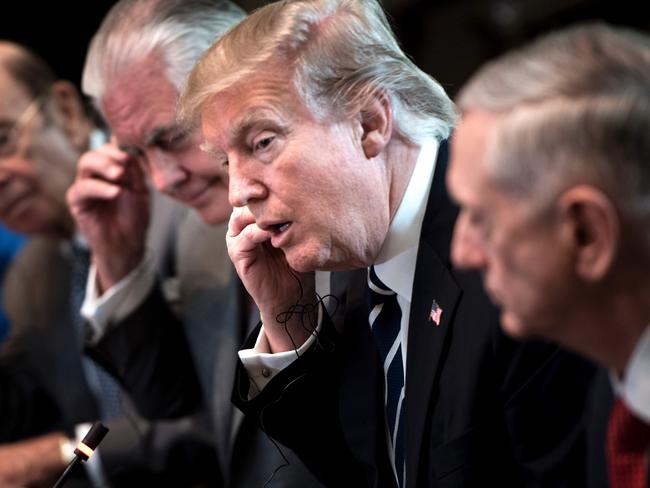 Secretary of Commerce Wilbur Ross, Secretary of State Rex Tillerson and US President Donald Trump. Picture: AFP