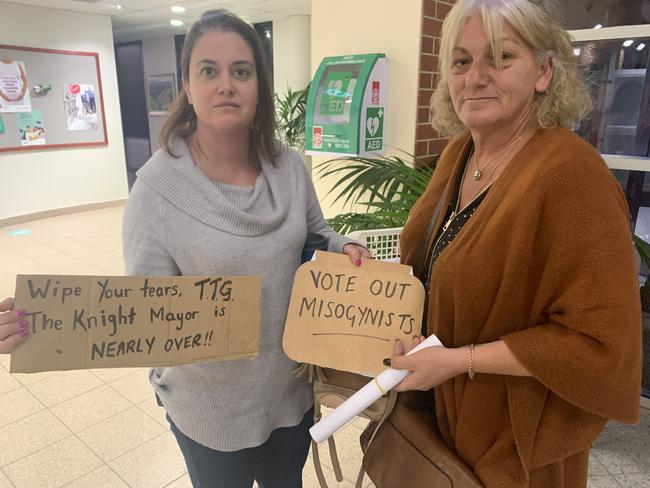 Adla Mattiske and Rose Morton protest against Tea Tree Gully mayor Kevin Knight before a meeting held by councillors to try to remove him. Picture: Ben Cameron