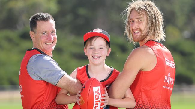 Essendon coach John Worsfold, James, 8, and captain Dyson Heppell will all take part in the Herald Sun Run For The Kids. Picture: Alex Coppel