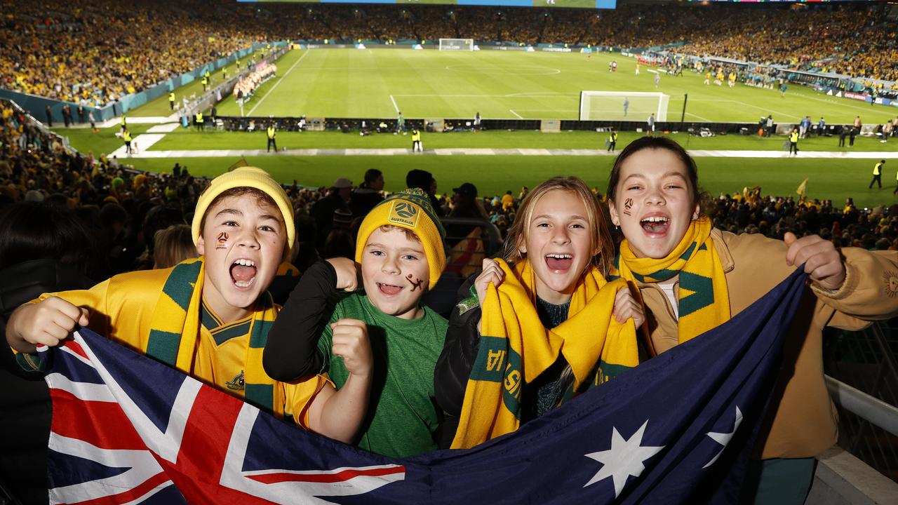 Young supporters have been getting right behind the Matildas. Oskar Lee, Leo Bergefall, Mae Shepherd and Evie Walkden were cheering on the team at the FIFA Womens World Cup Australia vs Denmark knockout game at Stadium Australia, Sydney Olympic Park, on Monday night. Picture: Jonathan Ng