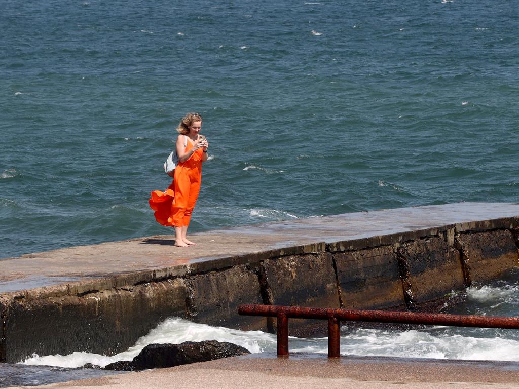 A local stands on a pier in Odesa after Russian missiles hit Ukraine's Black Sea holiday spot. Picture: AFP