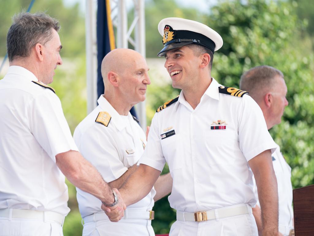 Lt. Cmdr. James Heydon, right, shakes hands with Submarine Agency Dir. Gen. Vice Adm. Jonathan Mead during a Naval Nuclear Power Training Command graduation ceremony at Joint Base Charleston in Goose Creek, South Carolina. Picture: Sean Rayford for The Daily Telegraph