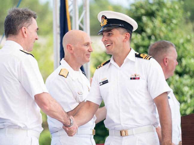 Lt. Cmdr. James Heydon, right, shakes hands with Submarine Agency Dir. Gen. Vice Adm. Jonathan Mead during a Naval Nuclear Power Training Command graduation ceremony at Joint Base Charleston in Goose Creek, South Carolina. Picture: Sean Rayford for The Daily Telegraph